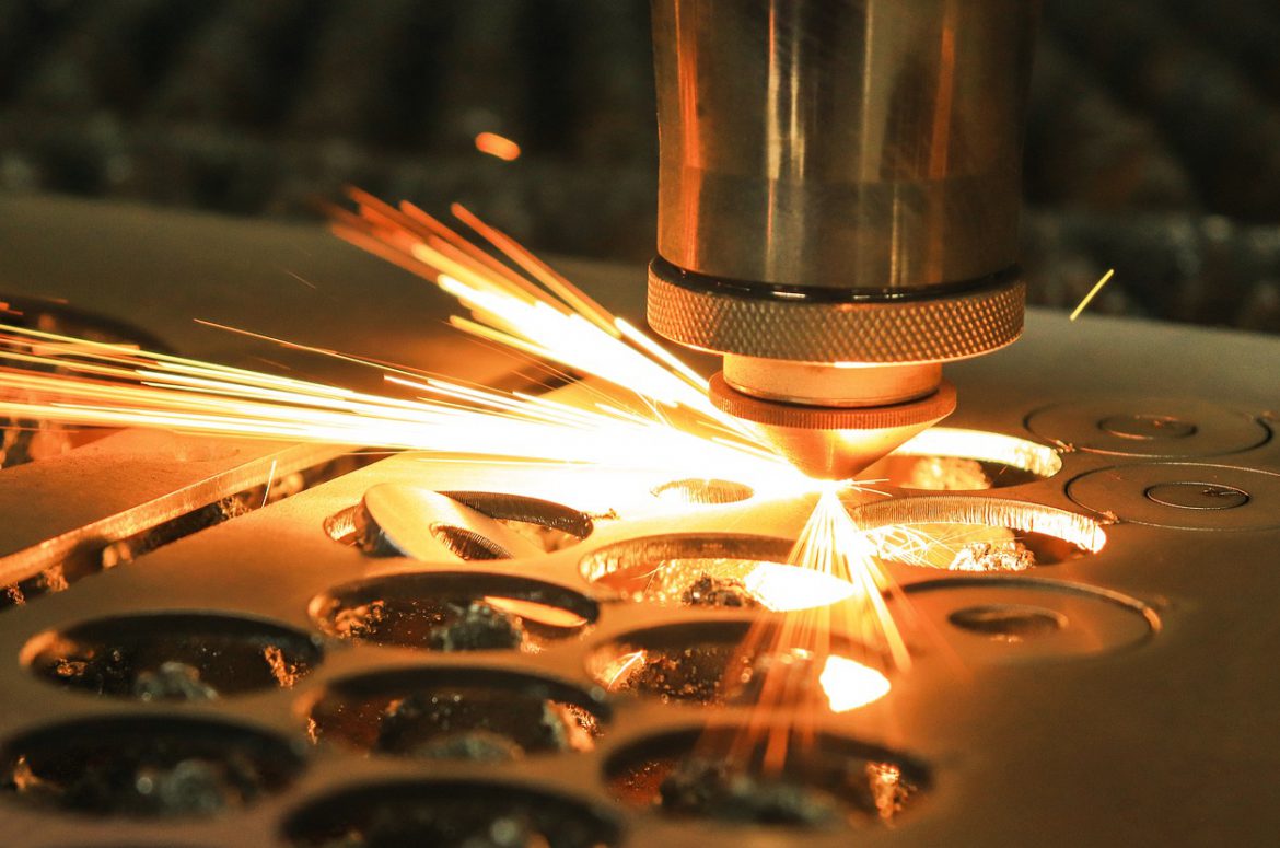 laser cut metal, sparks, laser