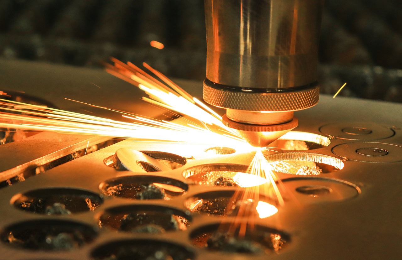 laser cut metal, sparks, laser